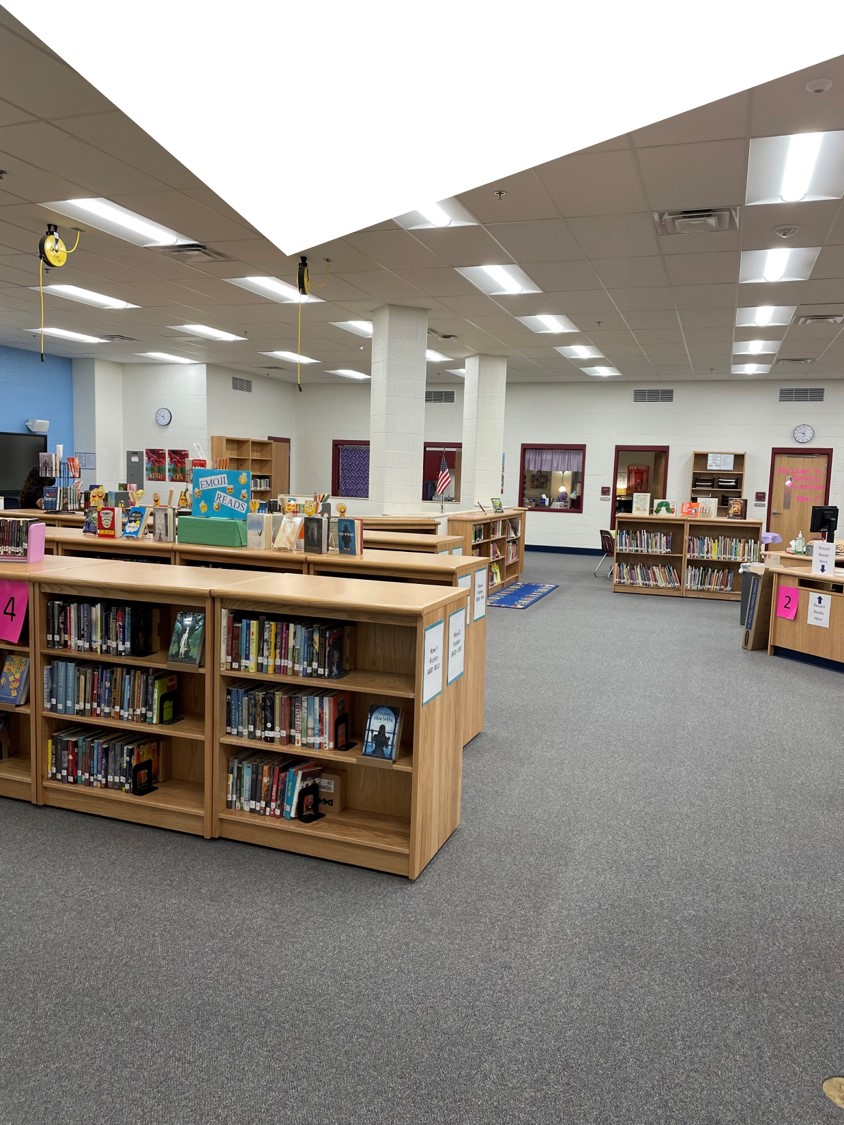 Beville library from entrance bookcases on left and right